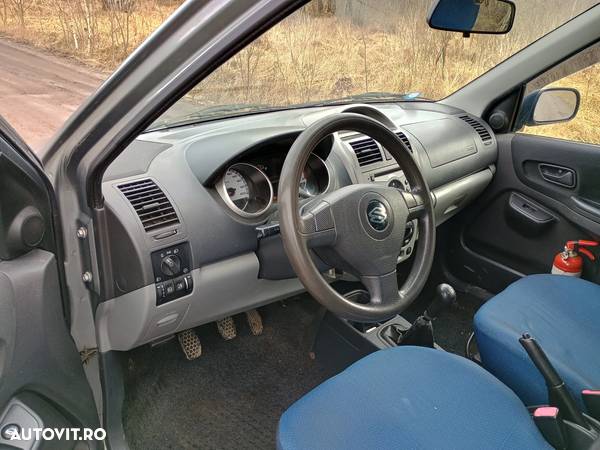 Suzuki Ignis 1.3 - 9