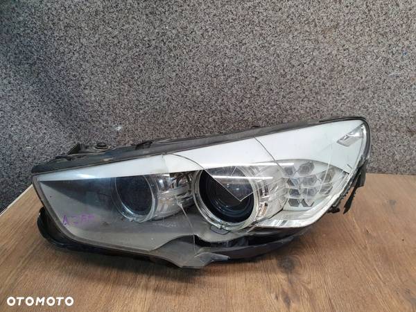 BMW F07 5GT LAMPA LEWA PRZÓD 7199609 - 1