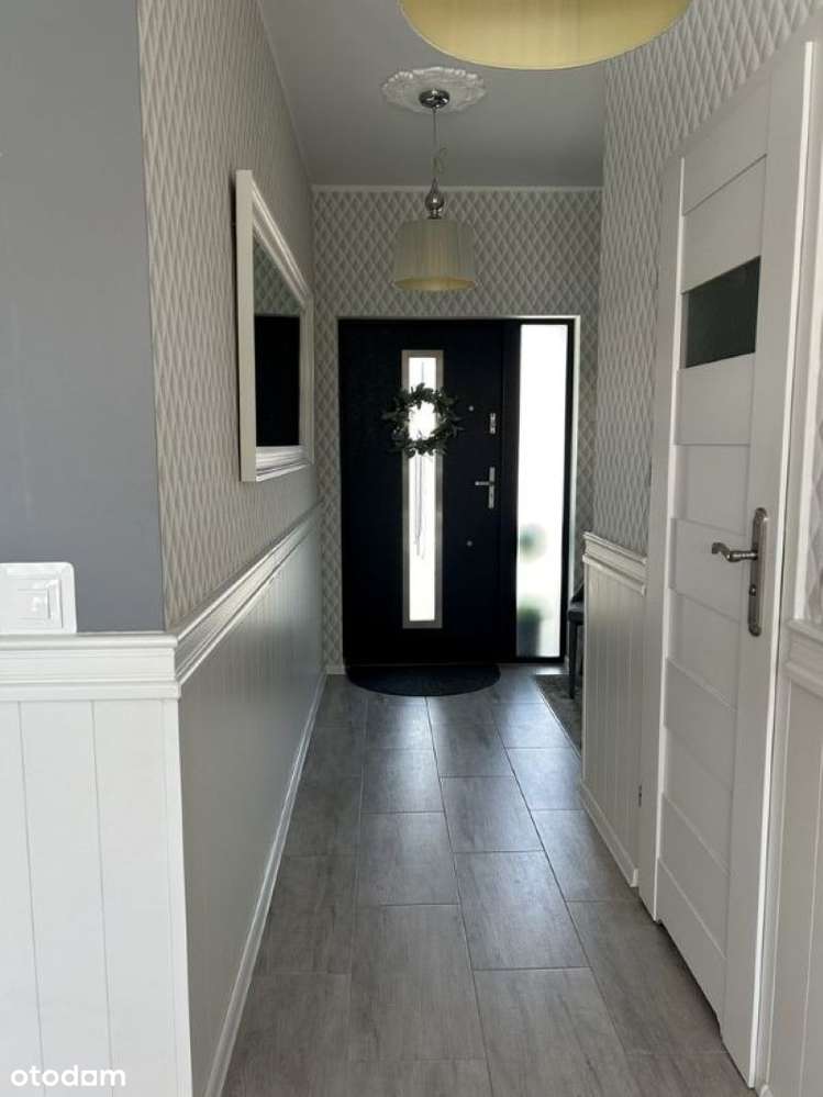 Dwupoziomowy apartament z dużym tarasem i miejscem postojowym.-4