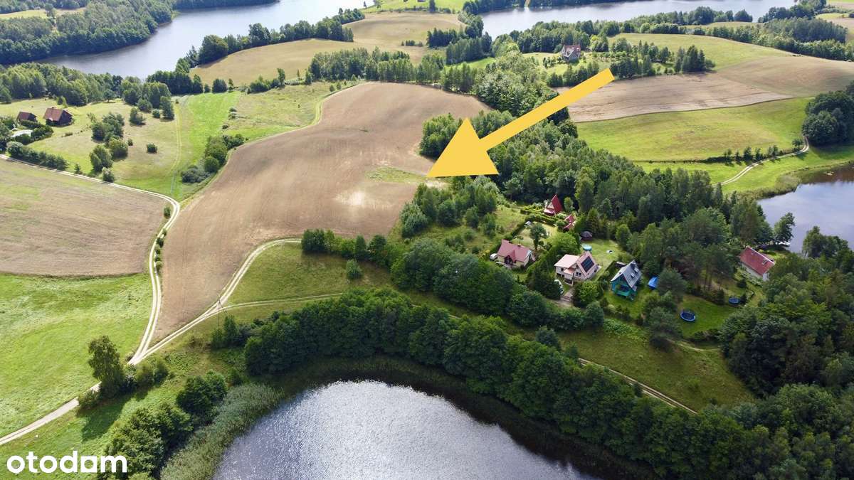 Bajeczna działka budowlana otoczona czterema jeziorami i gęstym lasem.-1