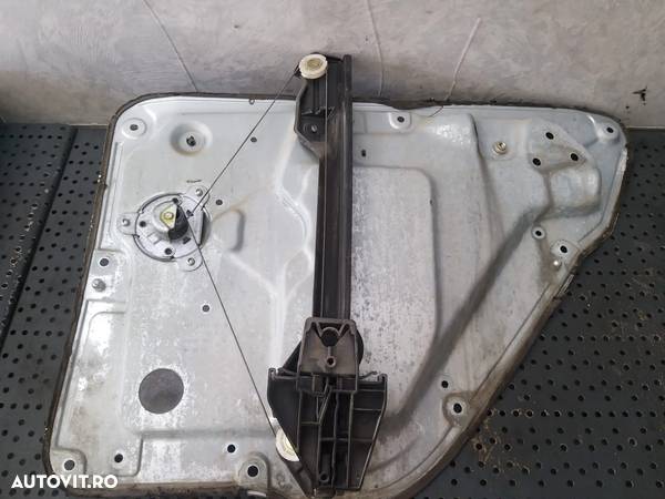 Macara manuala stanga spate skoda fabia 1 6y 6y0839755b - 1