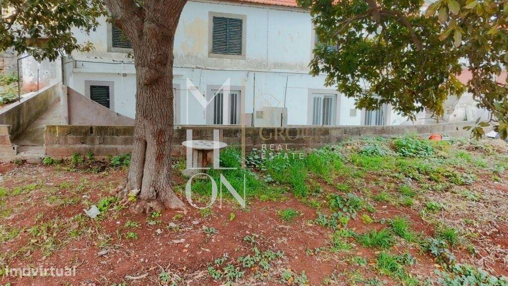 Moradia geminada inserida num lote de 400 m2 - Grande imagem: 4/12