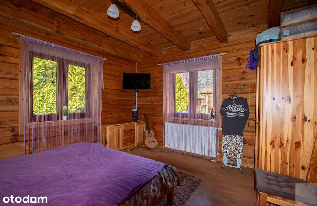 Dom z pełnego bala z zarybionym stawem-15