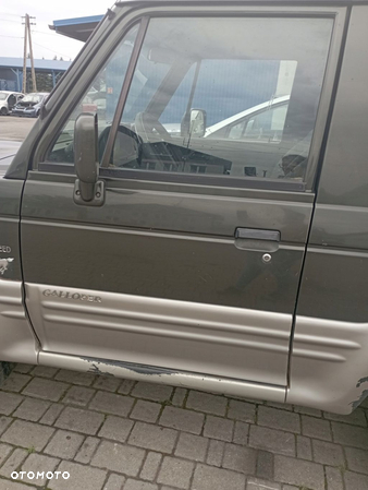 HYUNDAI GALLOPER 3D SZYBA Z DRZWI LEWYCH PRZEDNICH - 1