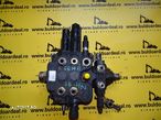 Distribuitor  fata buldoexcavator New Holland LB 110 - 6