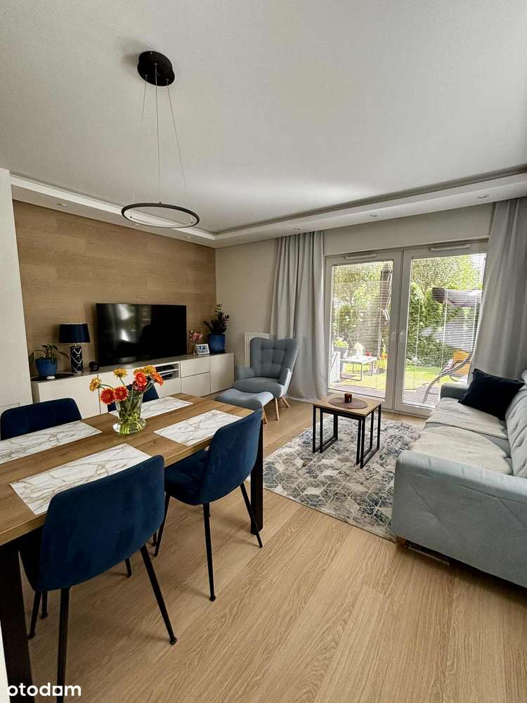 Komfortowe mieszkanie z ogrodem na sprzedaż