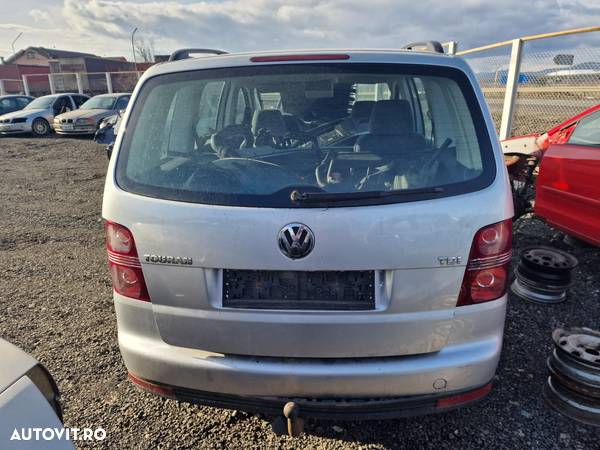 Dezmembram Volkswagen Touran, 1.9 TDI cod BXJ, an 2008, cutie manuala 6+1 - 7