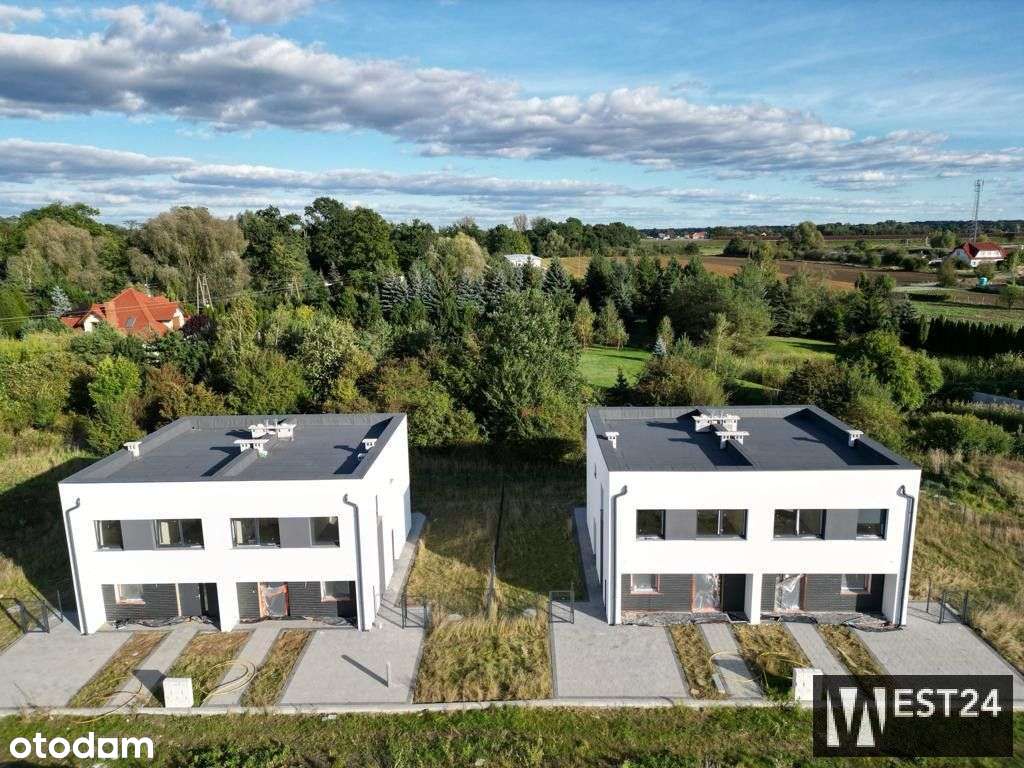 Nowoczesny dom z ogrodem w otoczeniu zieleni-2