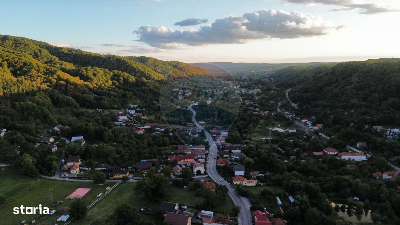 Casă de vânzare în Câmpulung la preț de apartament.-1