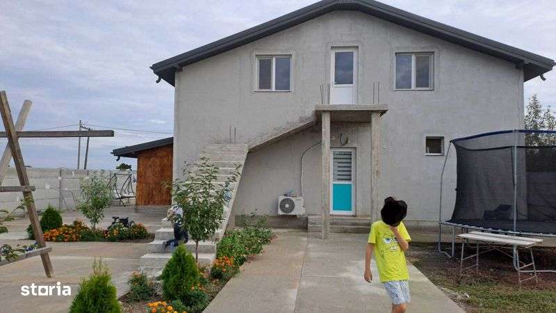 Vand/schimb casa  cu apartament - Imagine principală: 4/8