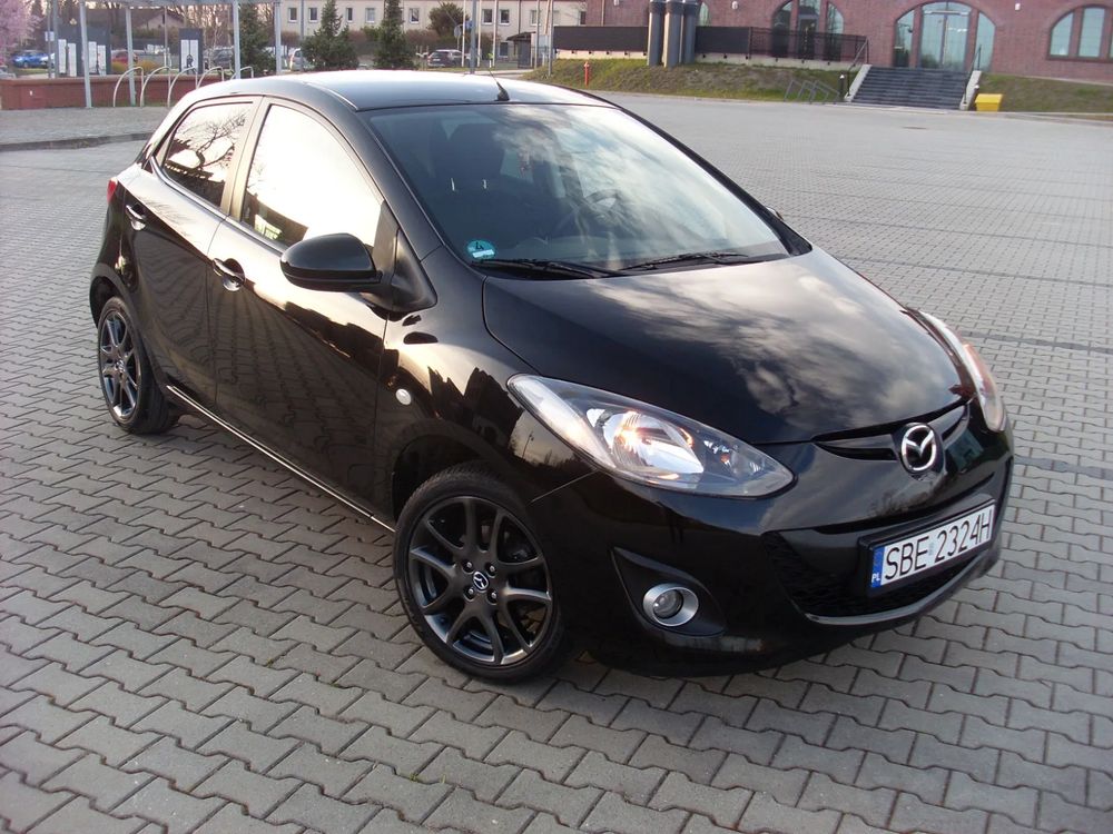 Mazda 2 II (2007-2014) 1.3 Navi + 2013