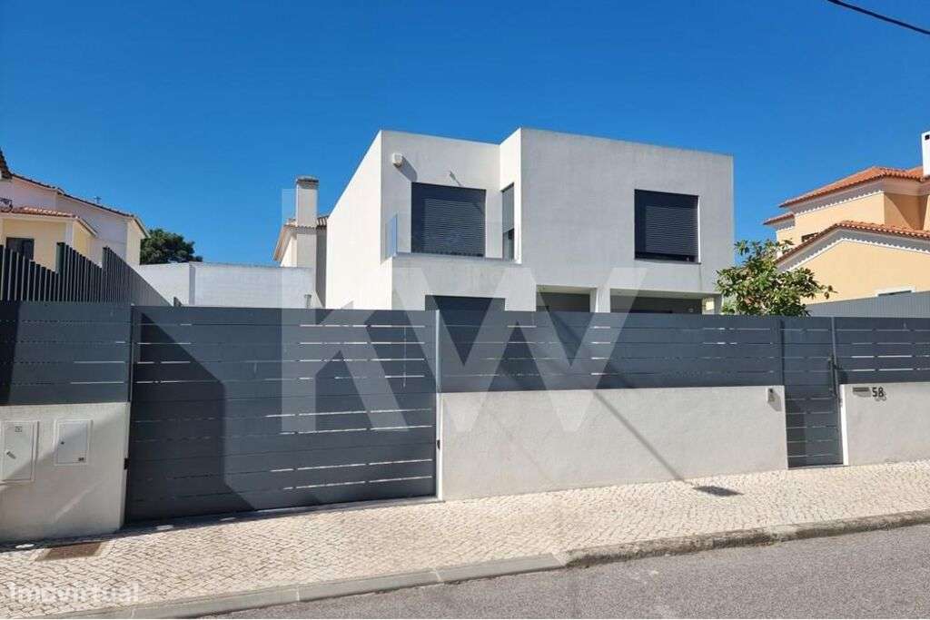 Moradia independente com quatro suites, jardim e piscina na Charneca d - Grande imagem: 5/30