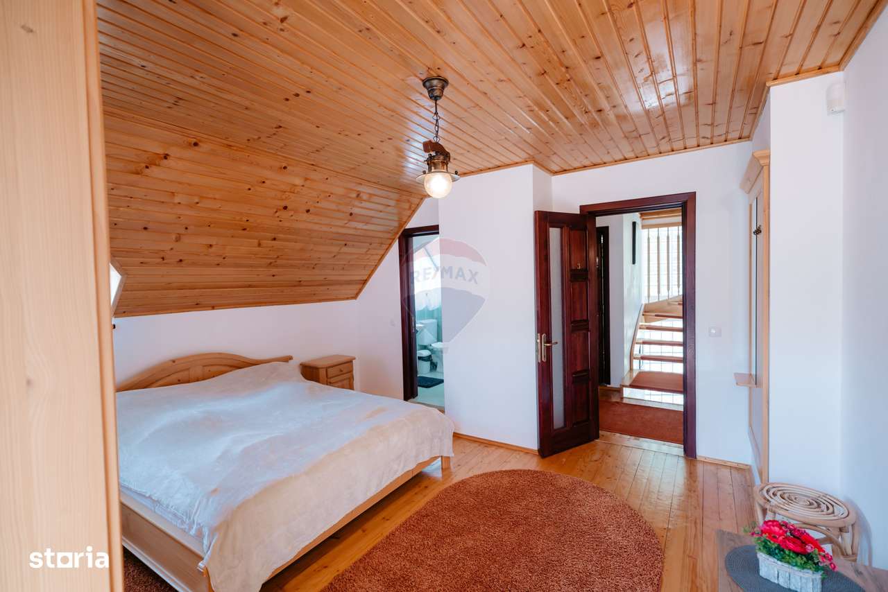 Vilă cu 6 camere, teren de 1000mp, într-un resort montan privat - Imagine principală: 5/20