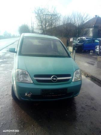 Dezmembrez Opel Meriva 1.7 - 1