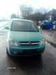 Dezmembrez Opel Meriva 1.7 - 1