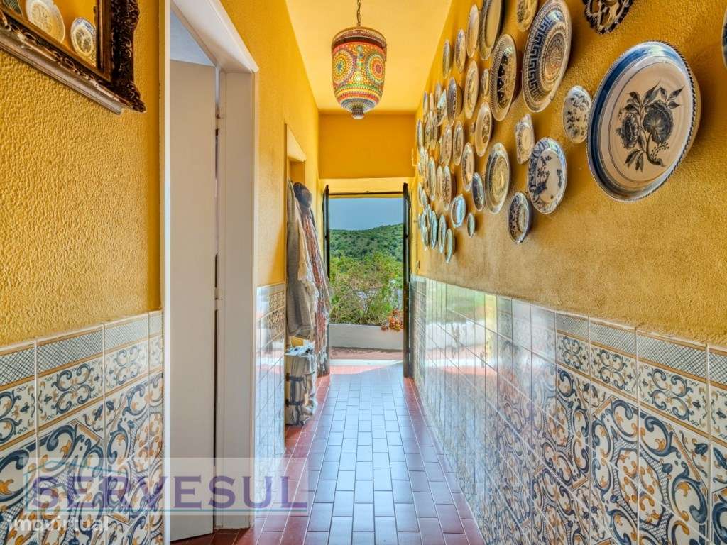 Charmosa moradia de 2 quartos de 121 m², inserida num terreno com 2...-23