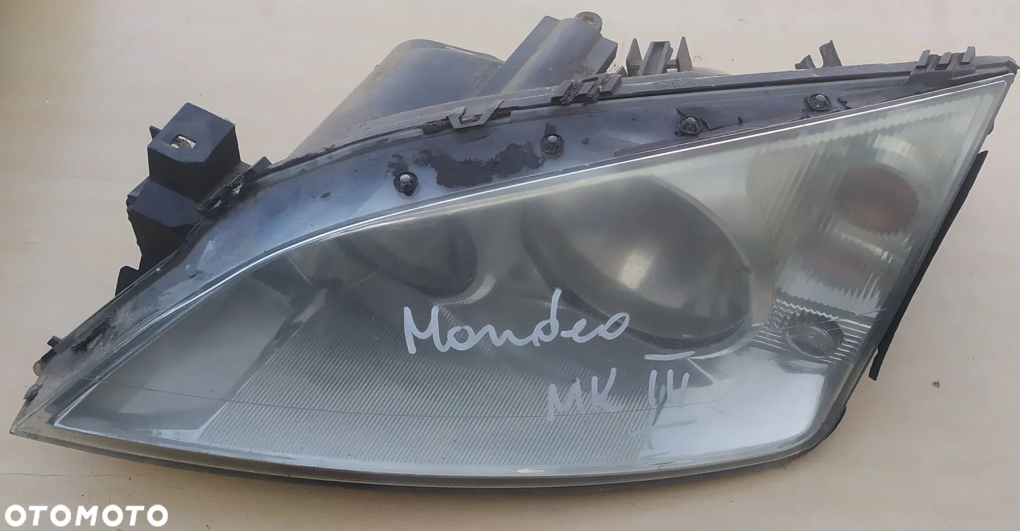 Lampa przednia lewa Mondeo MK III 3 / 0301174201 - 1