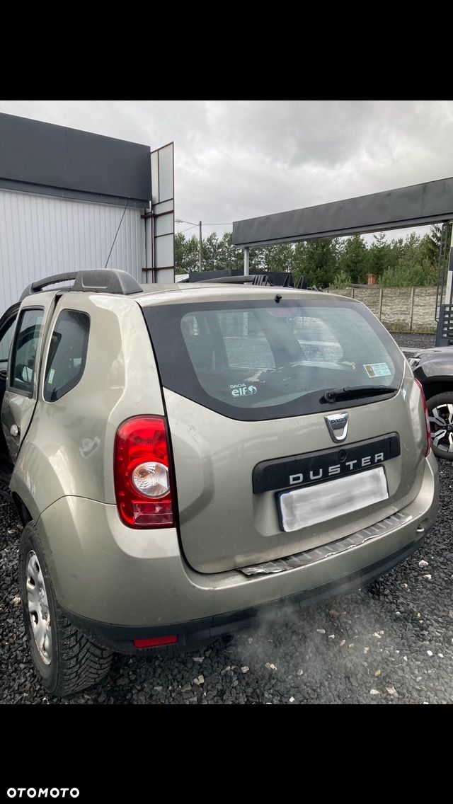 DACIA DUSTER 1  I  KLAPA TYLNA POKRYWA BAGAŻNIKA kompletna z SZYBĄ  TYLNIA TYŁ Wwa - 1