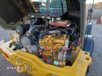 Caterpillar CAT 907 M - 23