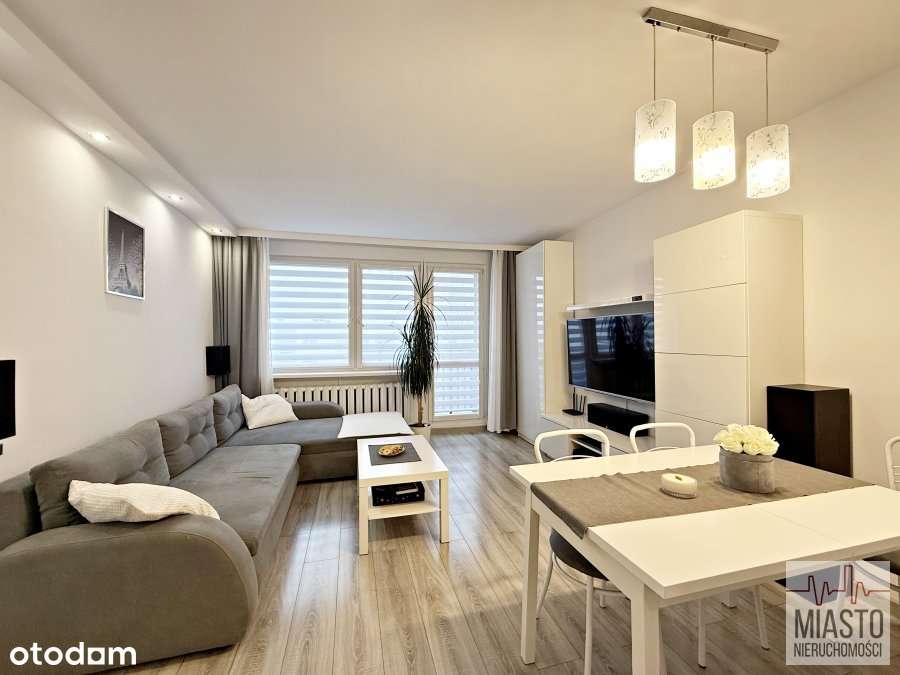 3 pokoje z balkonem - ul. Szymały.-2