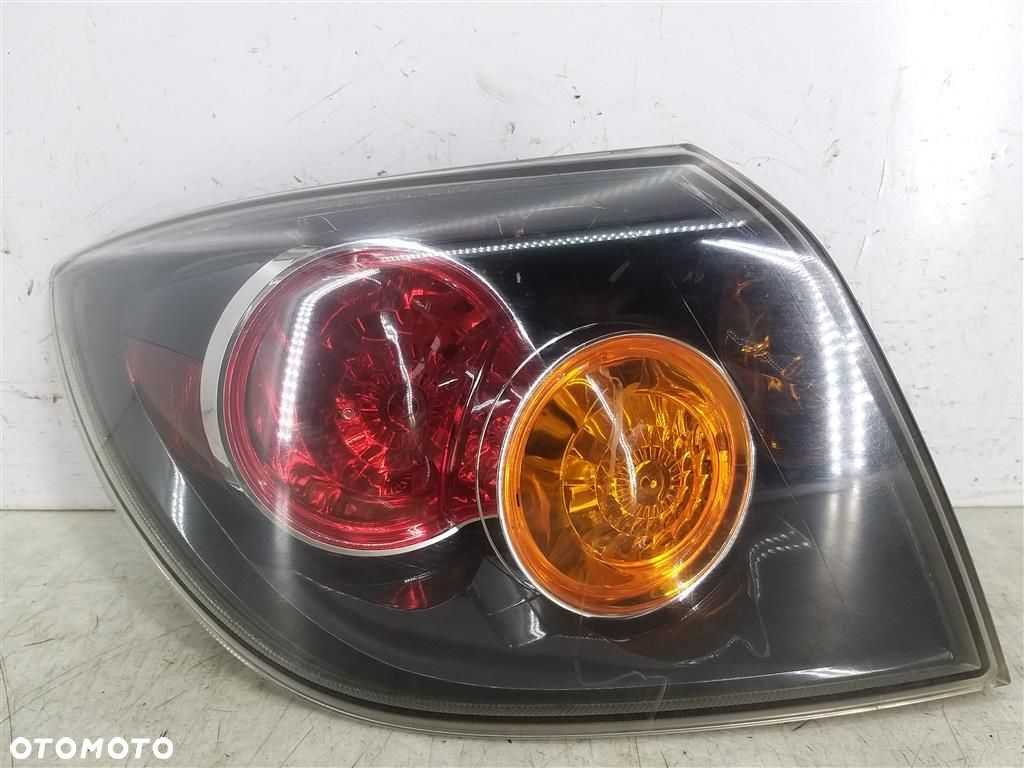 Lampa lewa tylna tył Mazda 3 I 03-09R HB 5 DRZWI STANLEY P2912 - 1