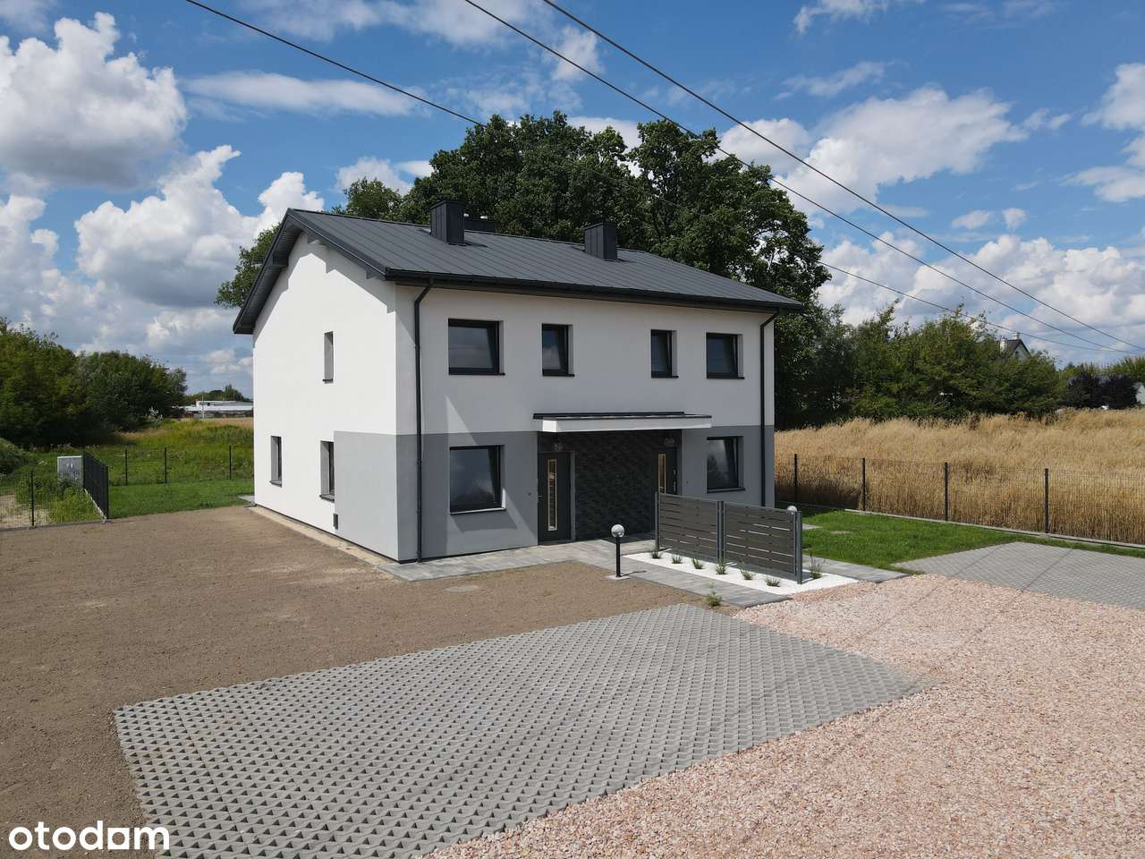 Nowoczesny dom w zabudowie bliźniaczej - Słomin-0