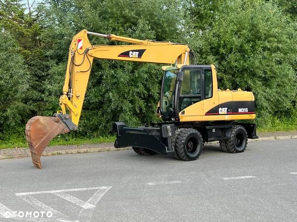 Caterpillar CAT M315C  CATERPILLAR SPROWADZONY  Bardzo Dobry Stan - 1