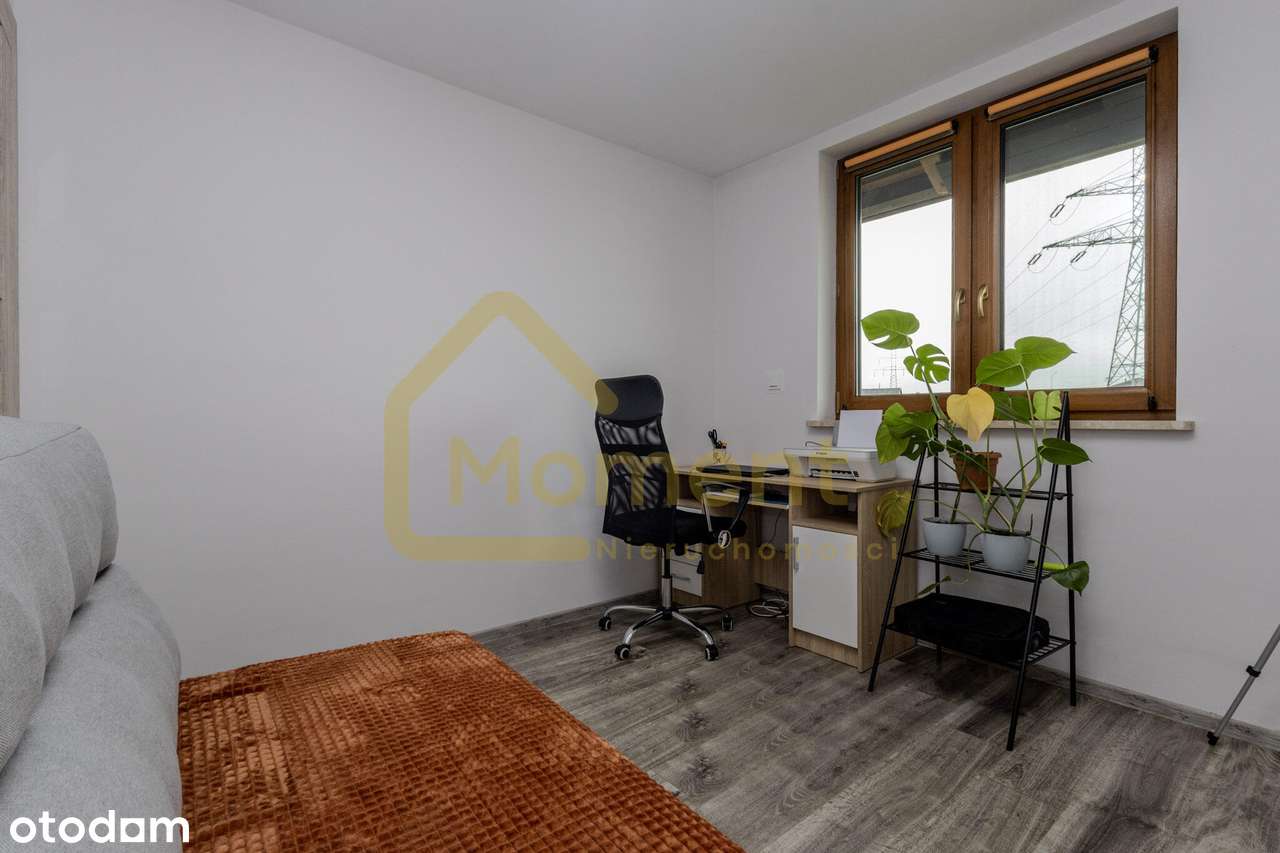 Ekonomiczny dom z garażem i pięknym ogrodem-14