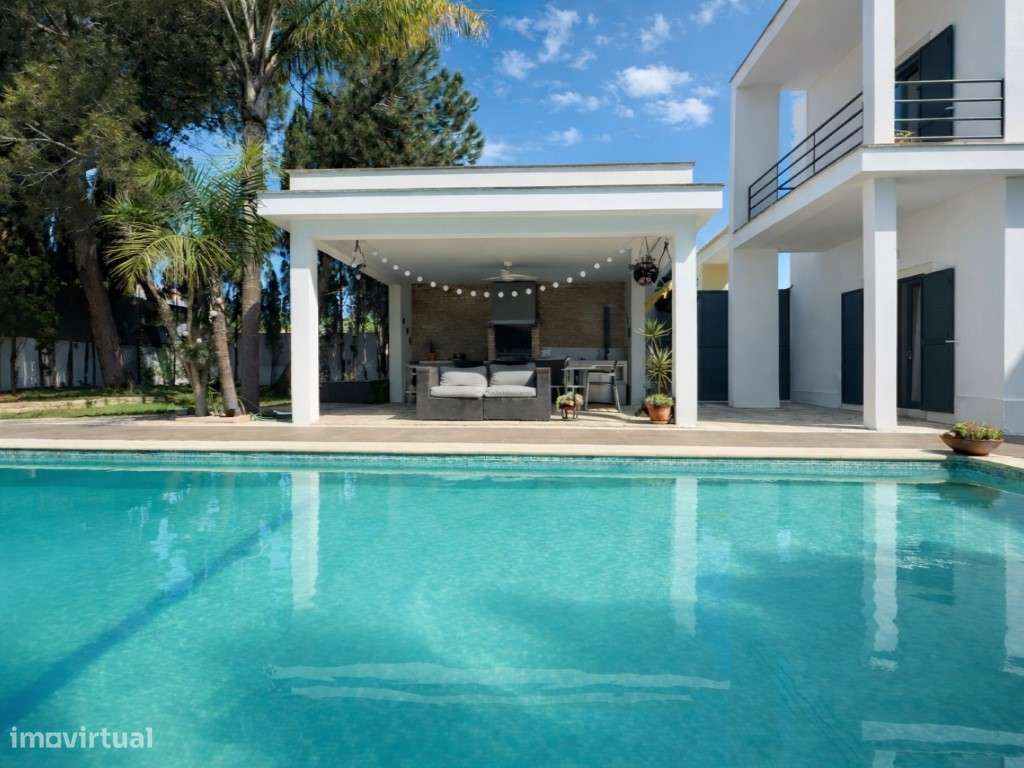 Moradia T4 isolada com piscina privada, jardim, garagem e 595 m² de...-43