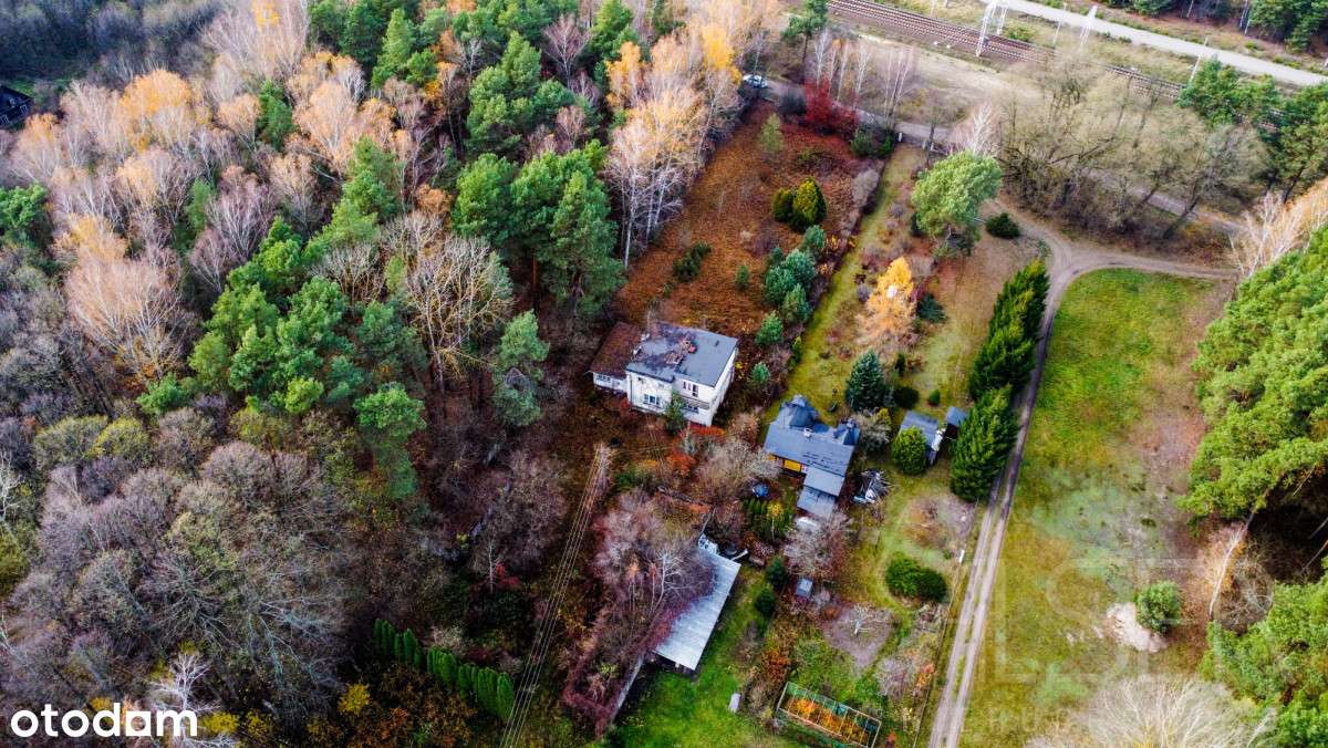Dom z lat 70 z garażem | 5500 mkw działki-1