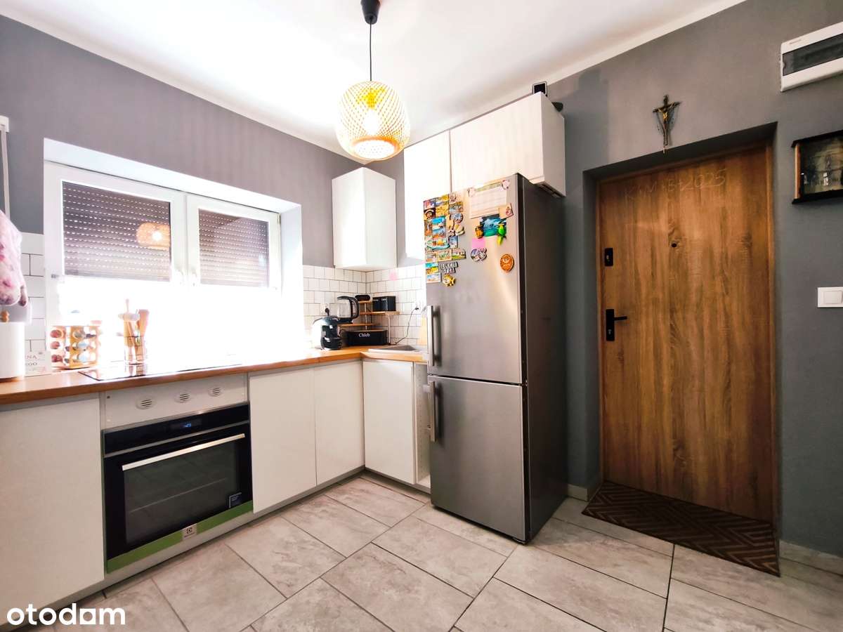 Dwupoziomowe mieszkanie z ogródkiem, Konin-Maliniec-7