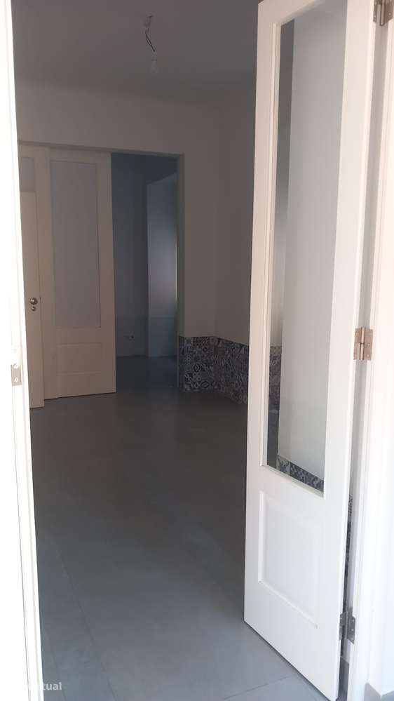 Oportunidade em Alcântara: T2 Moderno com Terraço Privativo - Grande imagem: 4/11