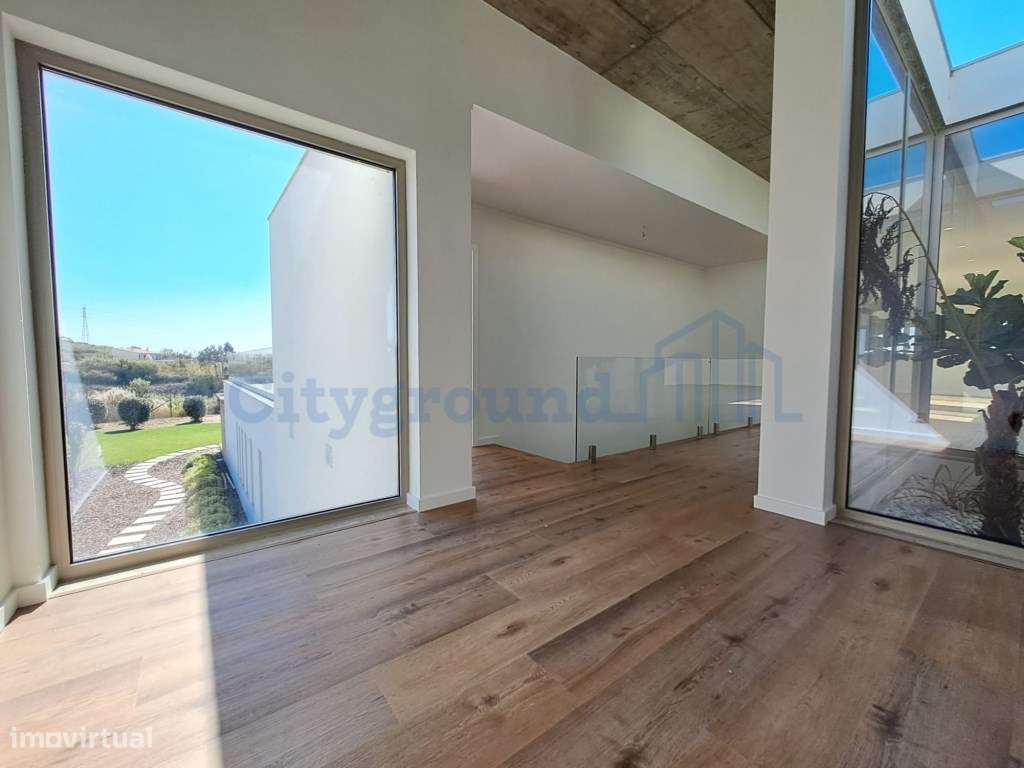 Deslumbrante moradia V4 com requinte e arquitetura única - Grande imagem: 5/44