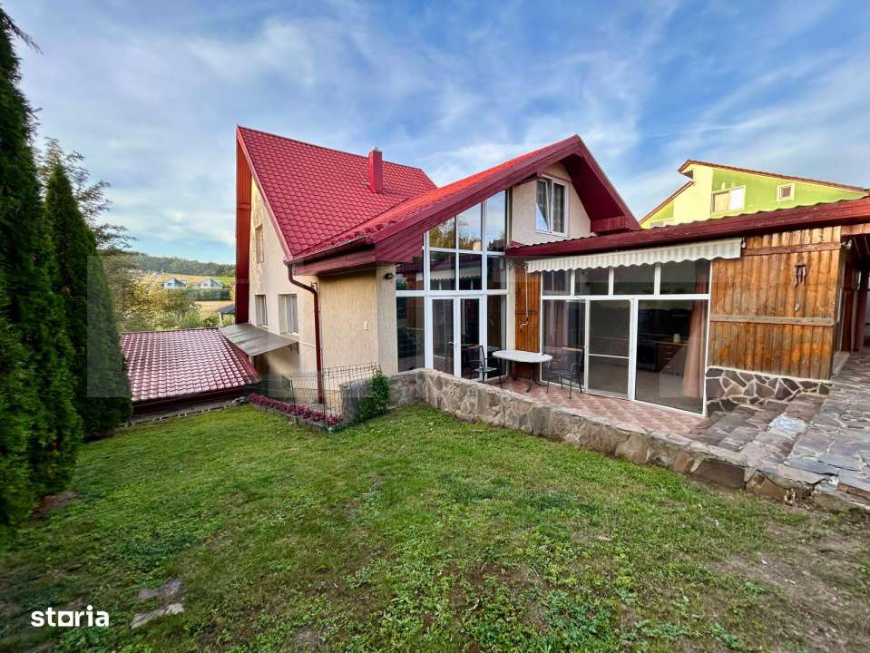 Casa moderna cu design deosebit,situata intr-o zona linistita. - Imagine principală: 5/19