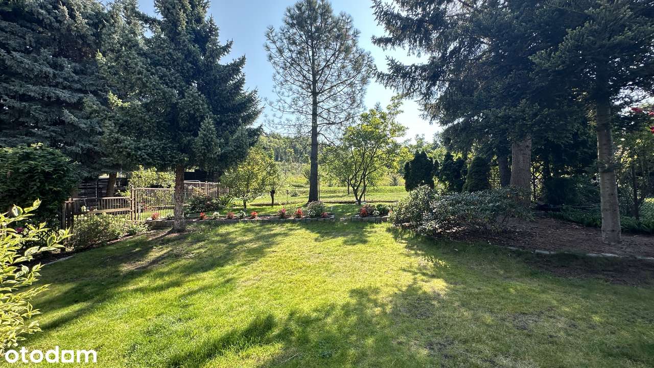 Pół bliźniaka 108 m kw z tarasem, pięknym ogrodem, piwnicą i garażem.-14