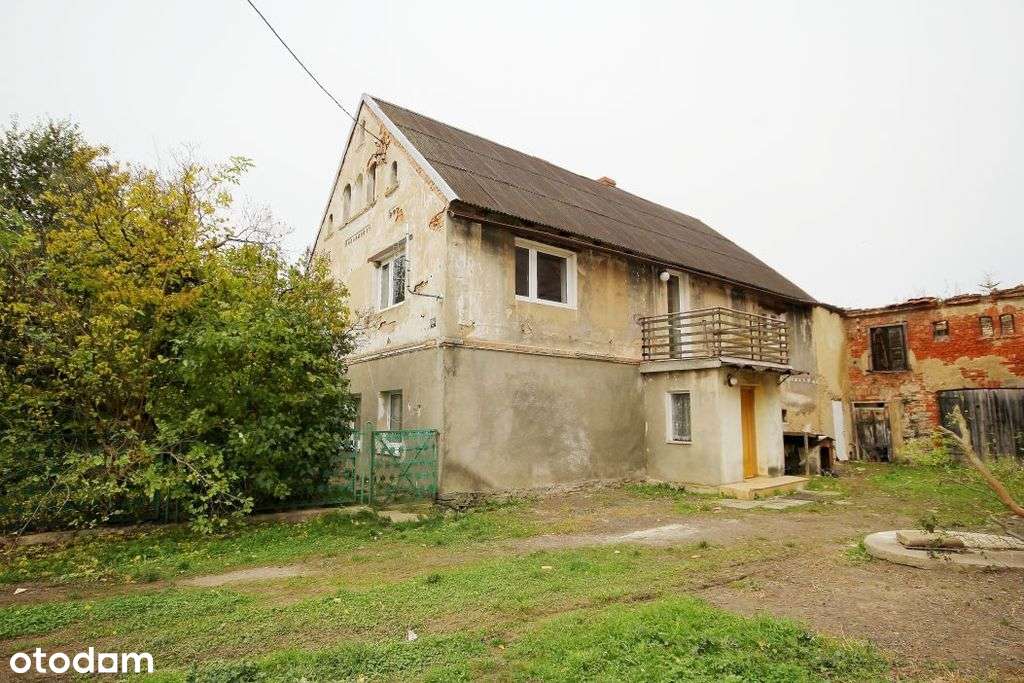 Budynek z obszerną działką z potencjałem-0