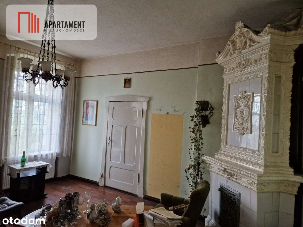 Dom w stylu dworkowym z dużą działką-3