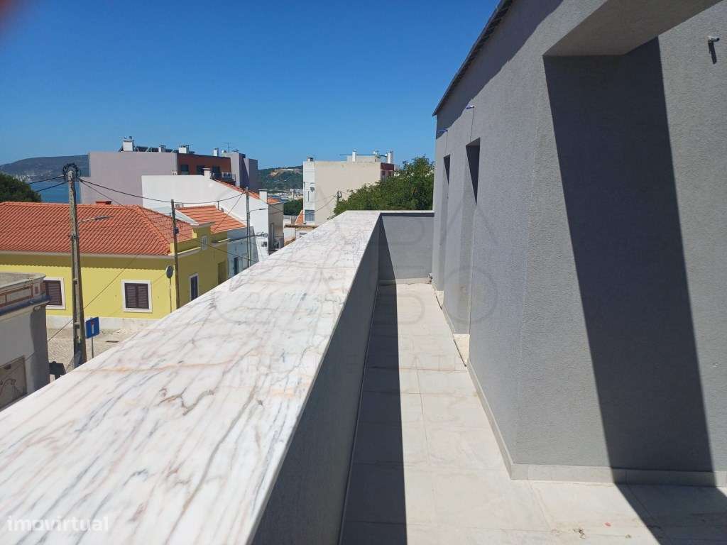Moradia T2 com terraço e garagem-13