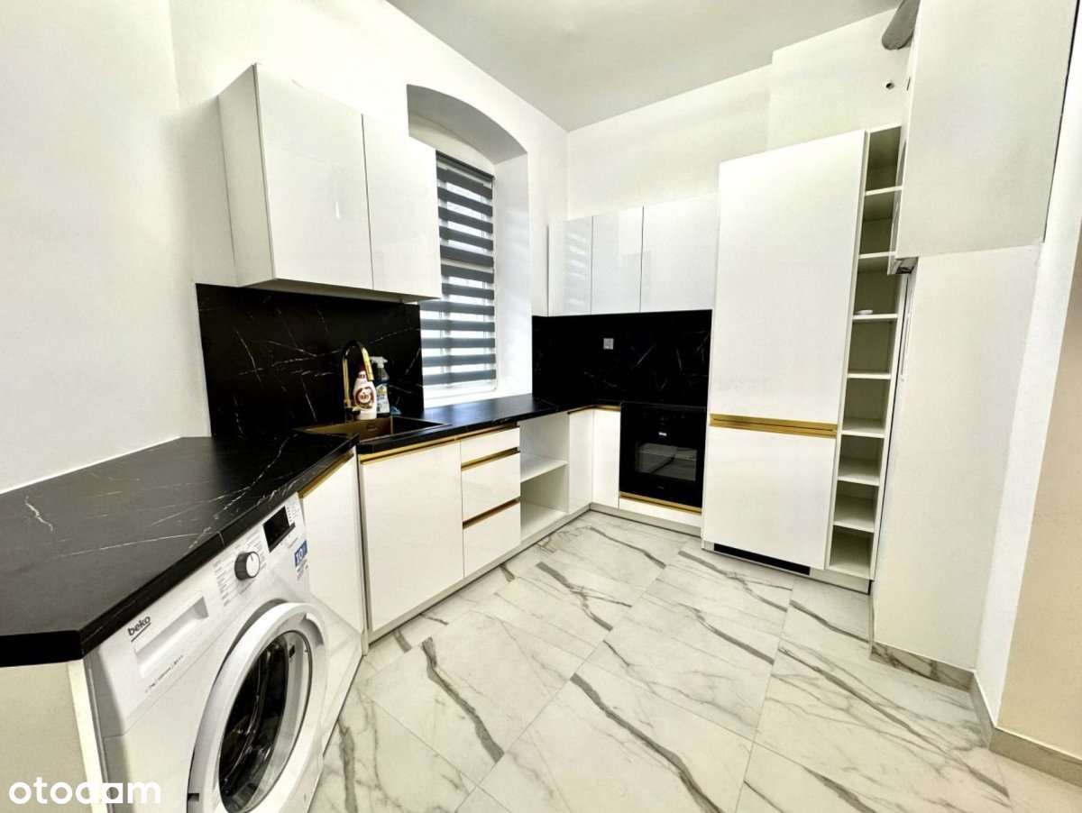 2-pokojowe mieszkanie (60m2) po kapitalnym remonci-4