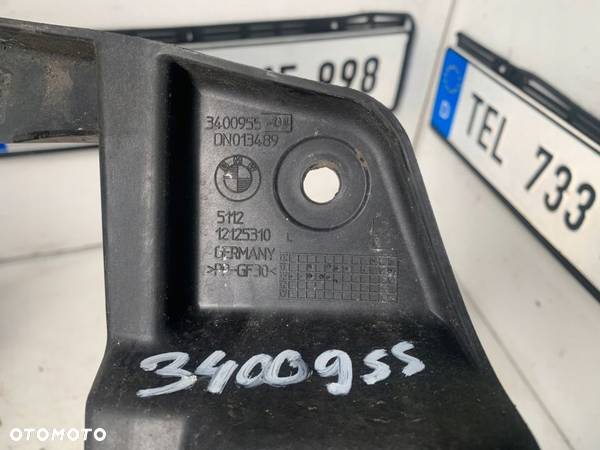 MOCOWANIE ŚLIZG ZDERZAKA TYŁ LEWE 3400955 BMW E83 - 2