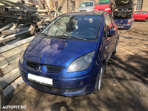 Dezmembrez Mitsubishi Colt CZ3 albastru 2006 - 1