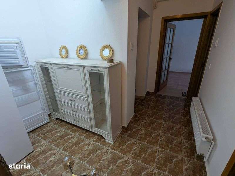 Apartament 2 camere + mansarda 45mp Onesti, zona de sus. - Imagine principală: 5/8