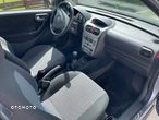 Opel Corsa 1.0 12V Cosmo - 6