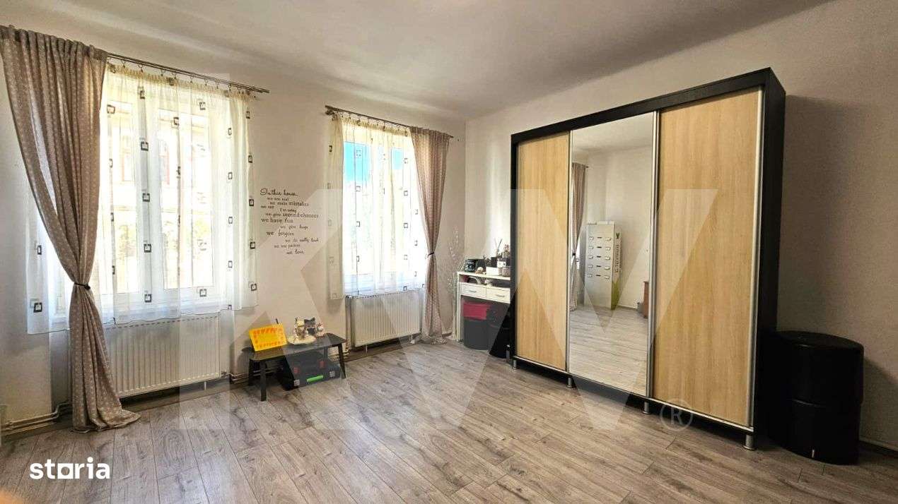 Casa individuala compusa din doua apartamente, cu teren liber de 540 m - Imagine principală: 2/19