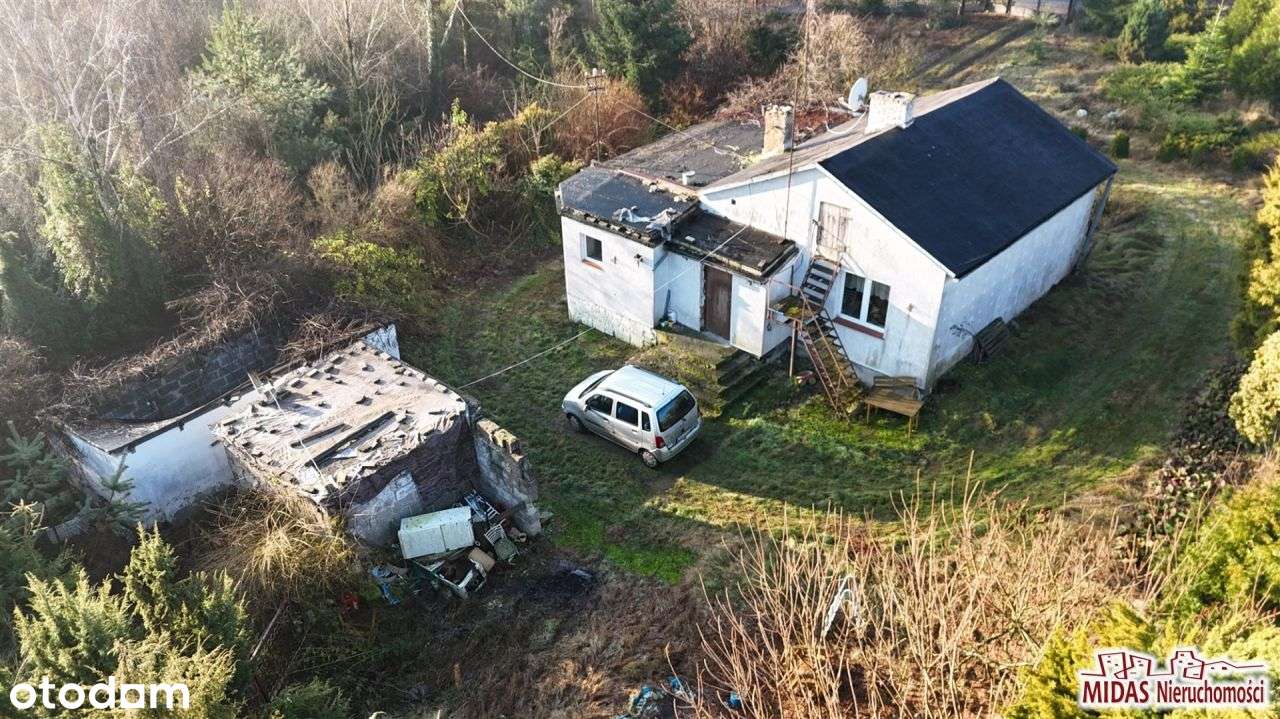 Dom do remontu na ładnej działce-5