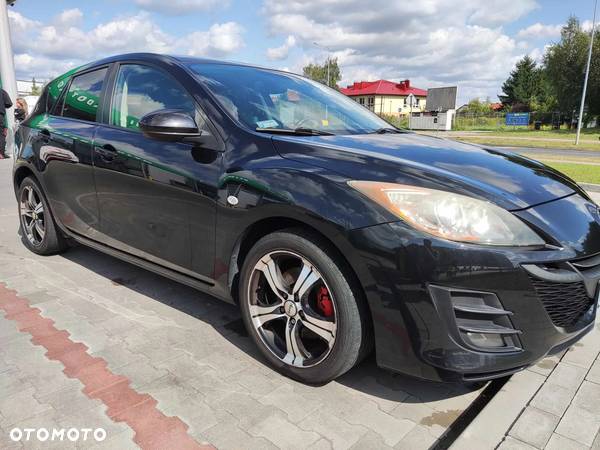 Mazda 3 2.0 Exclusive + - 3