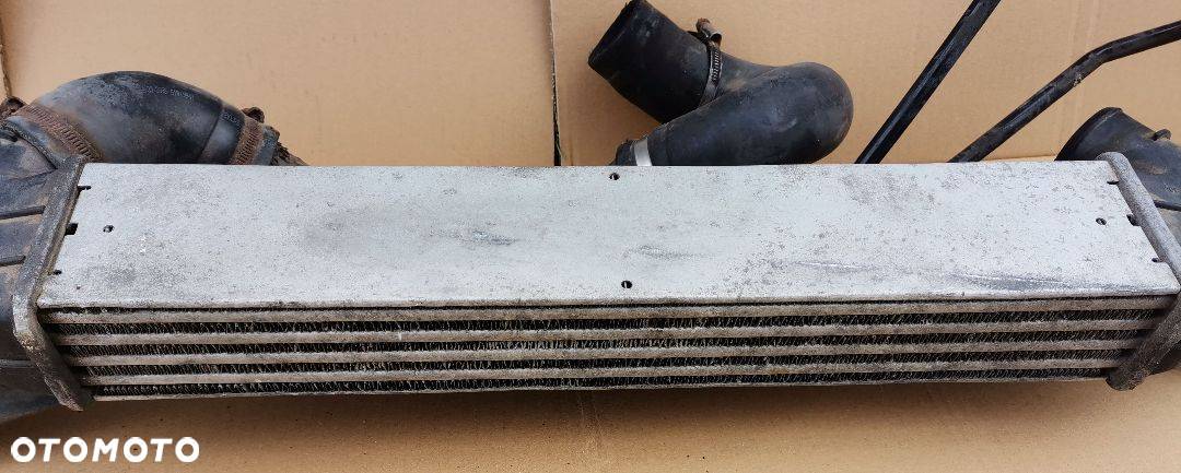 Intercooler chłodnica powietrza belka dolna Fiat Doblo 2006- - 2