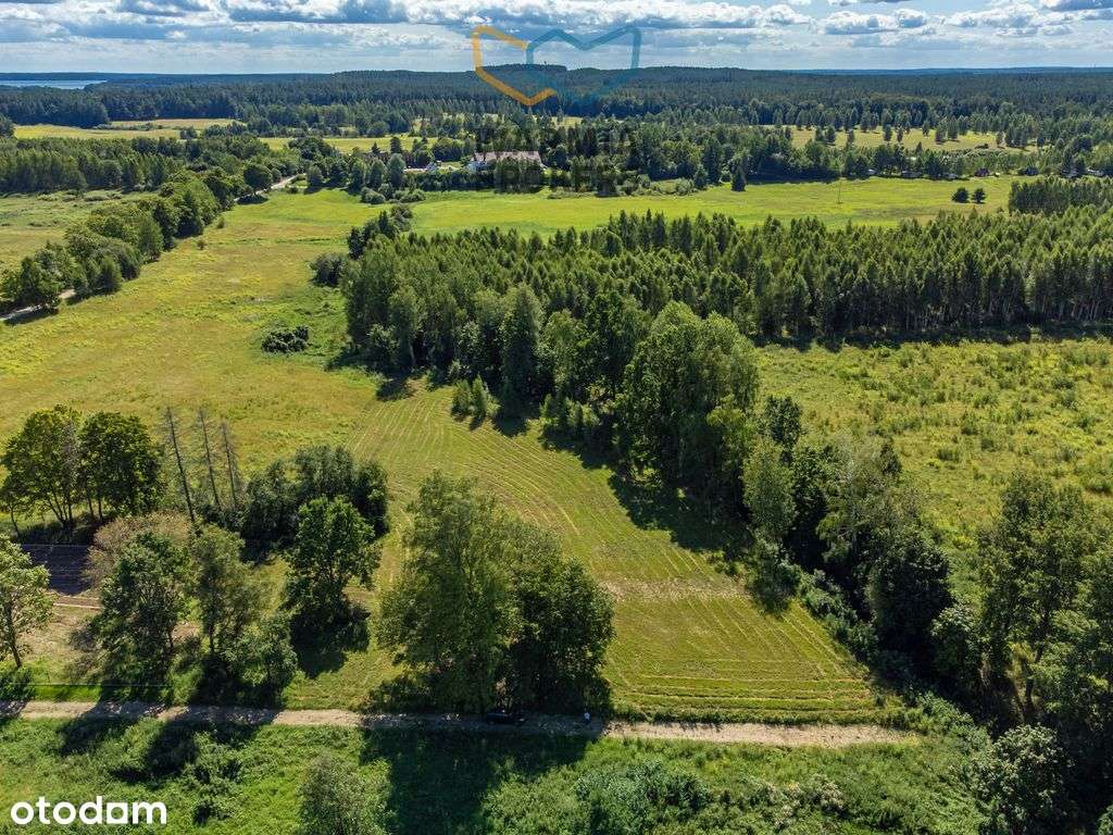 Działka budowlana nad jeziorem z dostępem do plaży-7