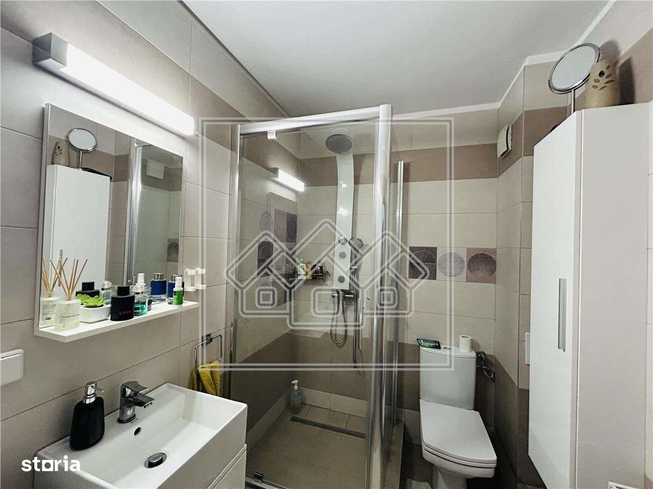 Apartament decomandat cu 3 camere, 2 bai, 2 balcoane, loc de parcare-16