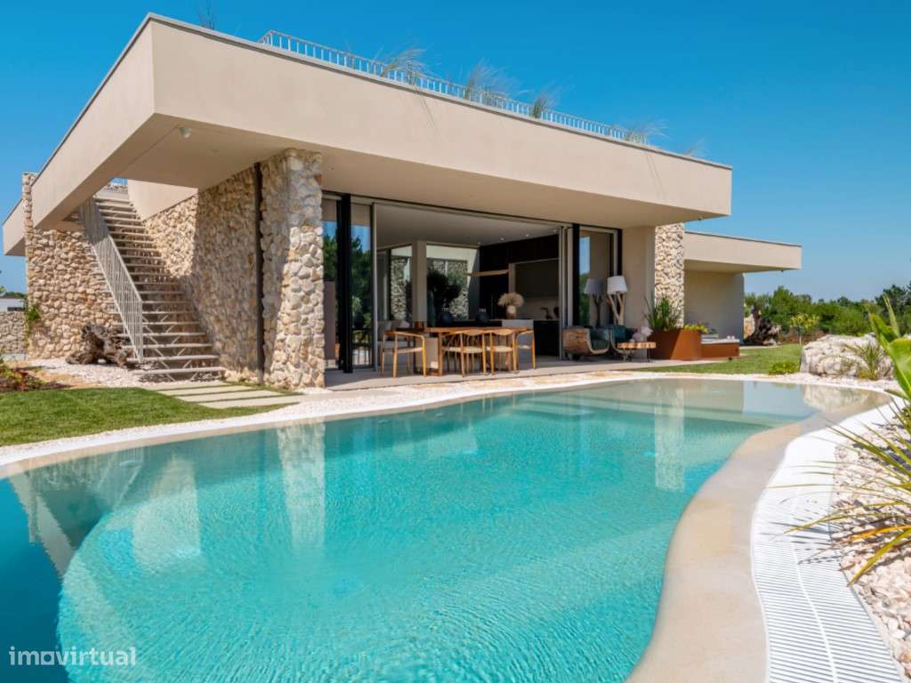 Moradia de extraordinária qualidade junto à lagoa, golfe e praia-0